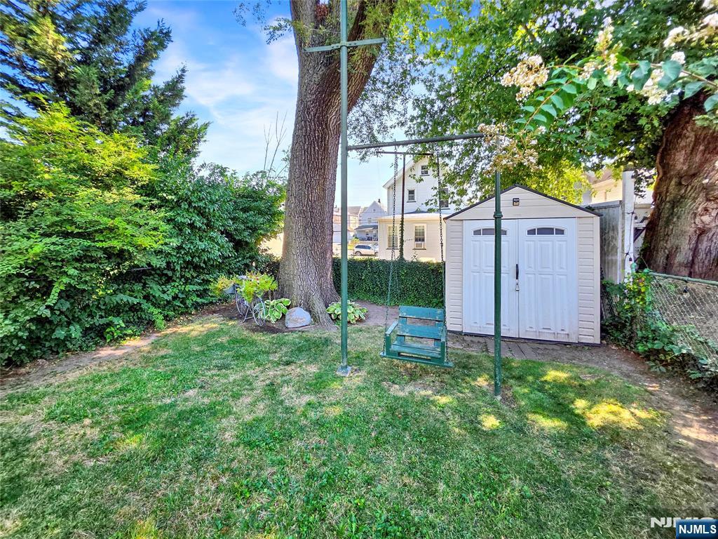 438 Forest Street Kearny, NJ 07032 - Photo 8 of 38 a front view of a house with garden