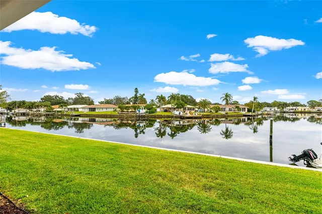 a view of a lake with a houses