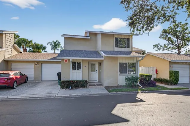 front view of a house with a street