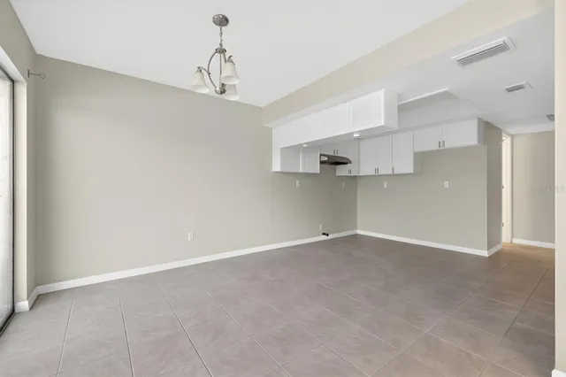 a view of a kitchen with a sink and dishwasher in a kitchen