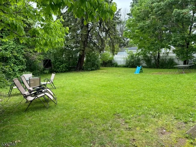 a view of a backyard with a patio