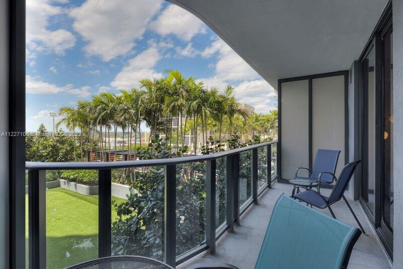 121 Northeast 34th Street, Unit 814 Miami, FL 33137 - Photo 17 of 38 a view of balcony with furniture