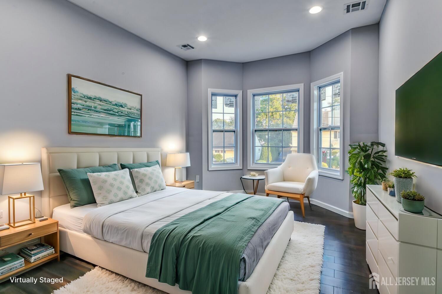 31 Ashley Road Edison, NJ 08817 - Photo 29 of 47 a bedroom with a large bed and windows