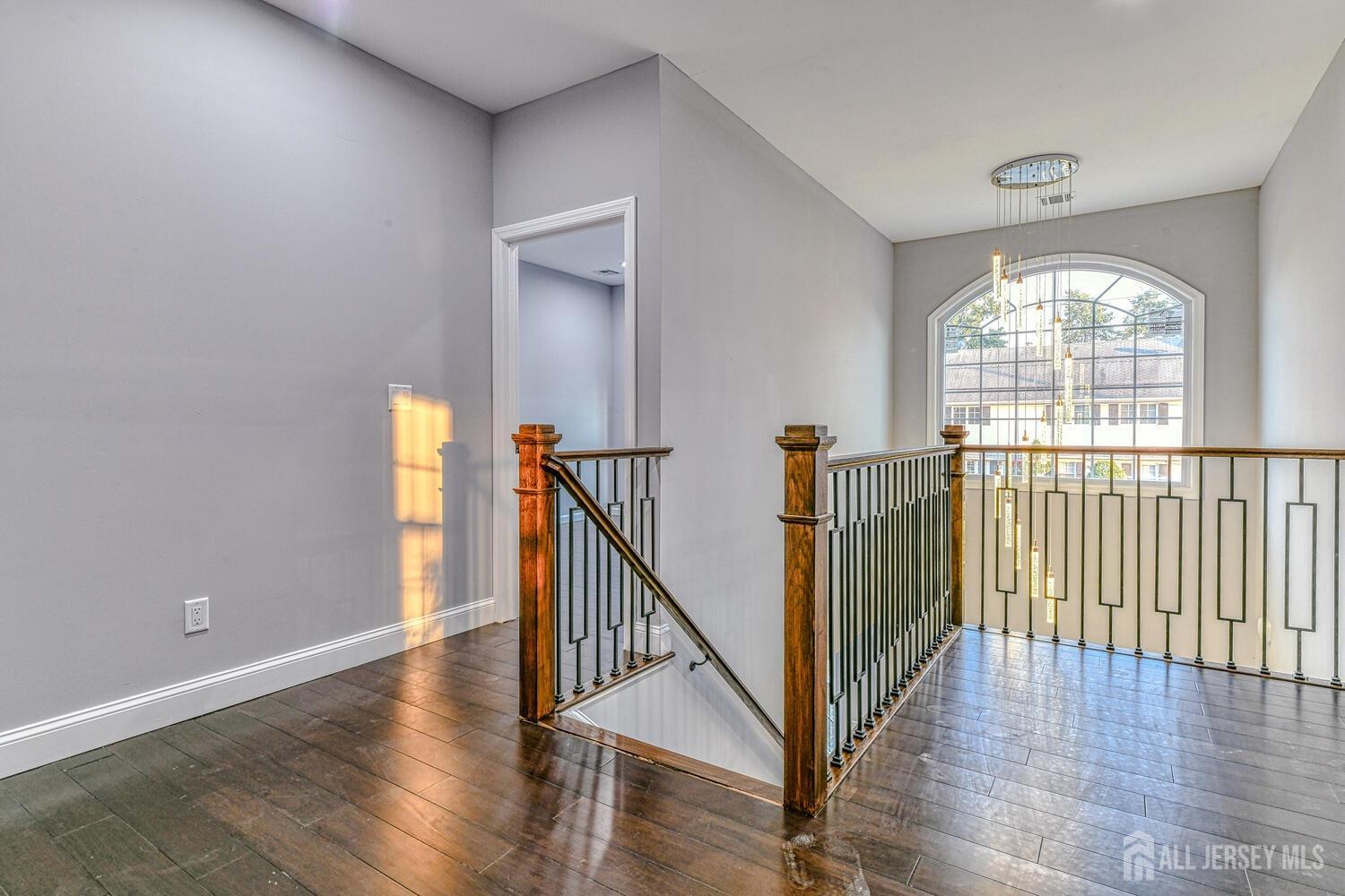 31 Ashley Road Edison, NJ 08817 - Photo 30 of 47 a view of front door with wooden floor