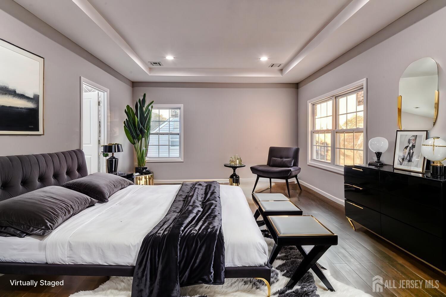 31 Ashley Road Edison, NJ 08817 - Photo 32 of 47 a hotel room with two beds and a dresser