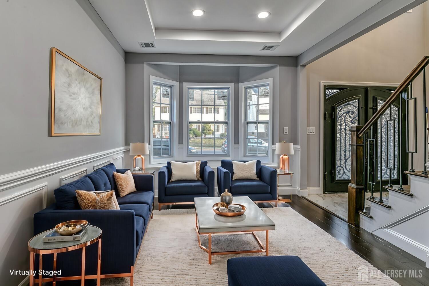 31 Ashley Road Edison, NJ 08817 - Photo 4 of 47 a living room with furniture and a large window