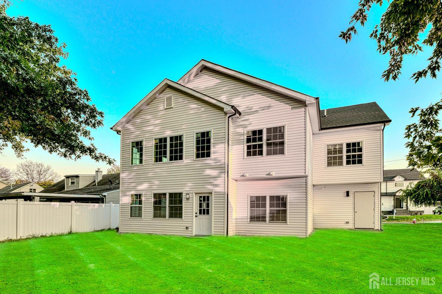 31 Ashley Road Edison, NJ 08817 - Photo 41 of 47 a front view of a house with a yard