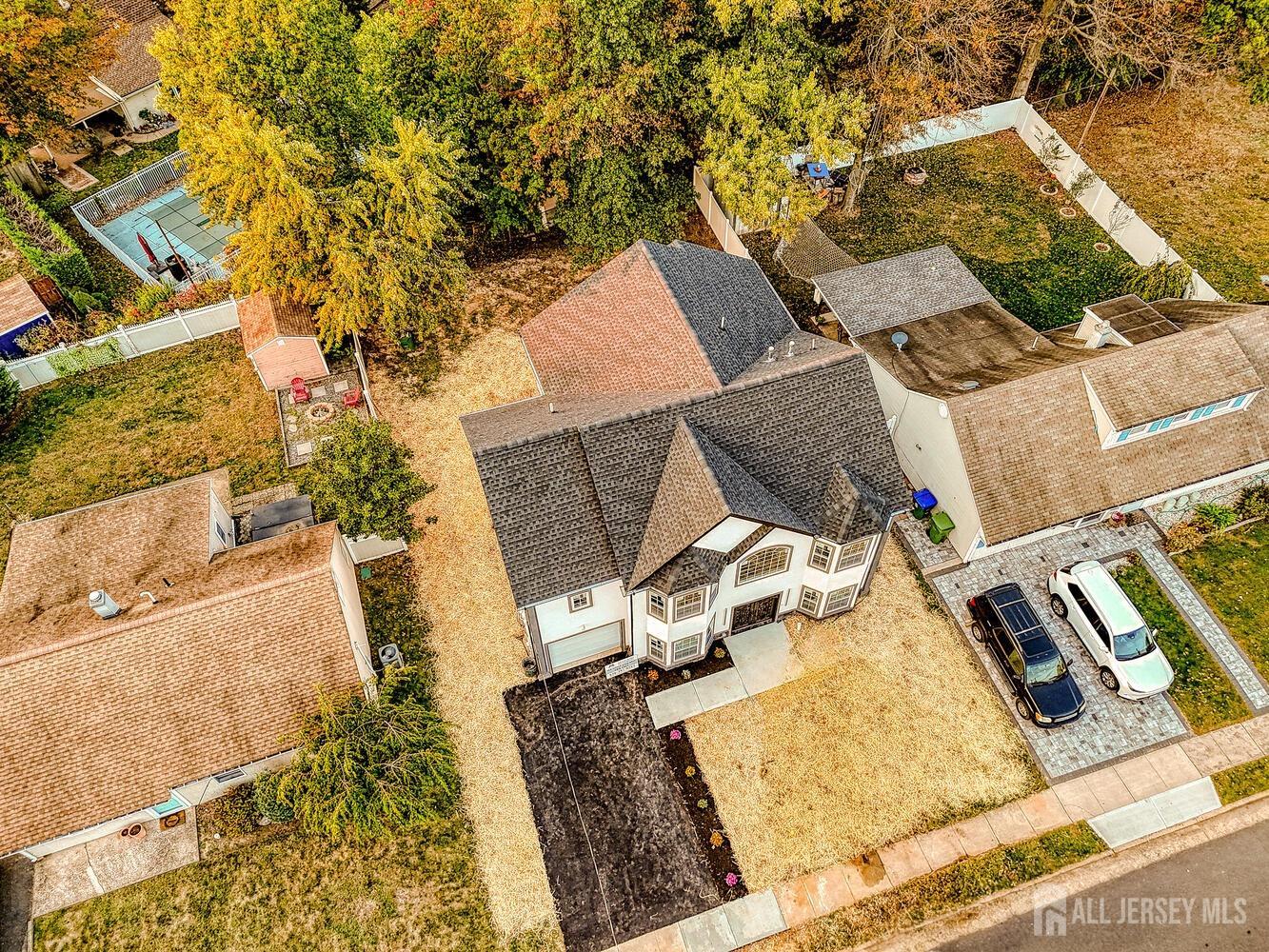 31 Ashley Road Edison, NJ 08817 - Photo 46 of 47 an aerial view of a house with swimming pool and sitting area