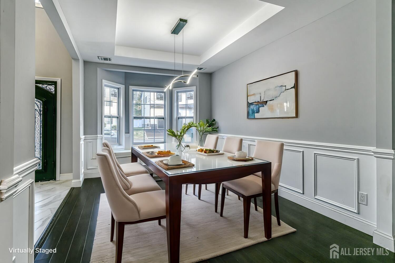 31 Ashley Road Edison, NJ 08817 - Photo 7 of 47 a view of a dining room with furniture window and wooden floor
