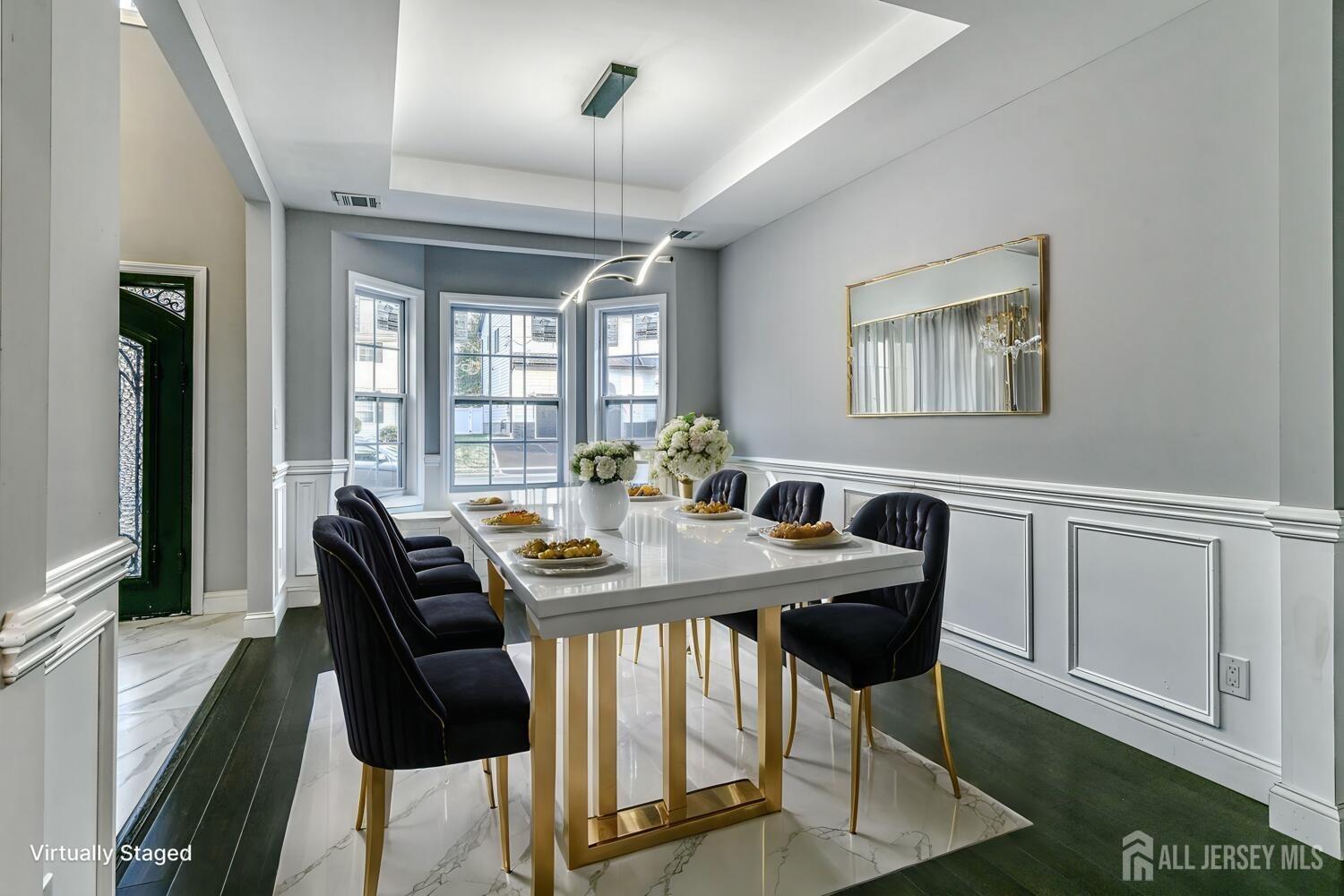 31 Ashley Road Edison, NJ 08817 - Photo 8 of 47 a view of a dining room with furniture window and wooden floor