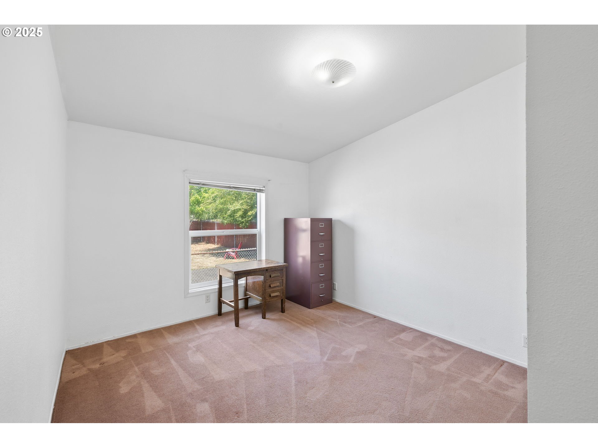 1949 Southeast Palmquist Road, Unit 121 Gresham, OR 97080 - Photo 23 of 37 a workspace with furniture and a window