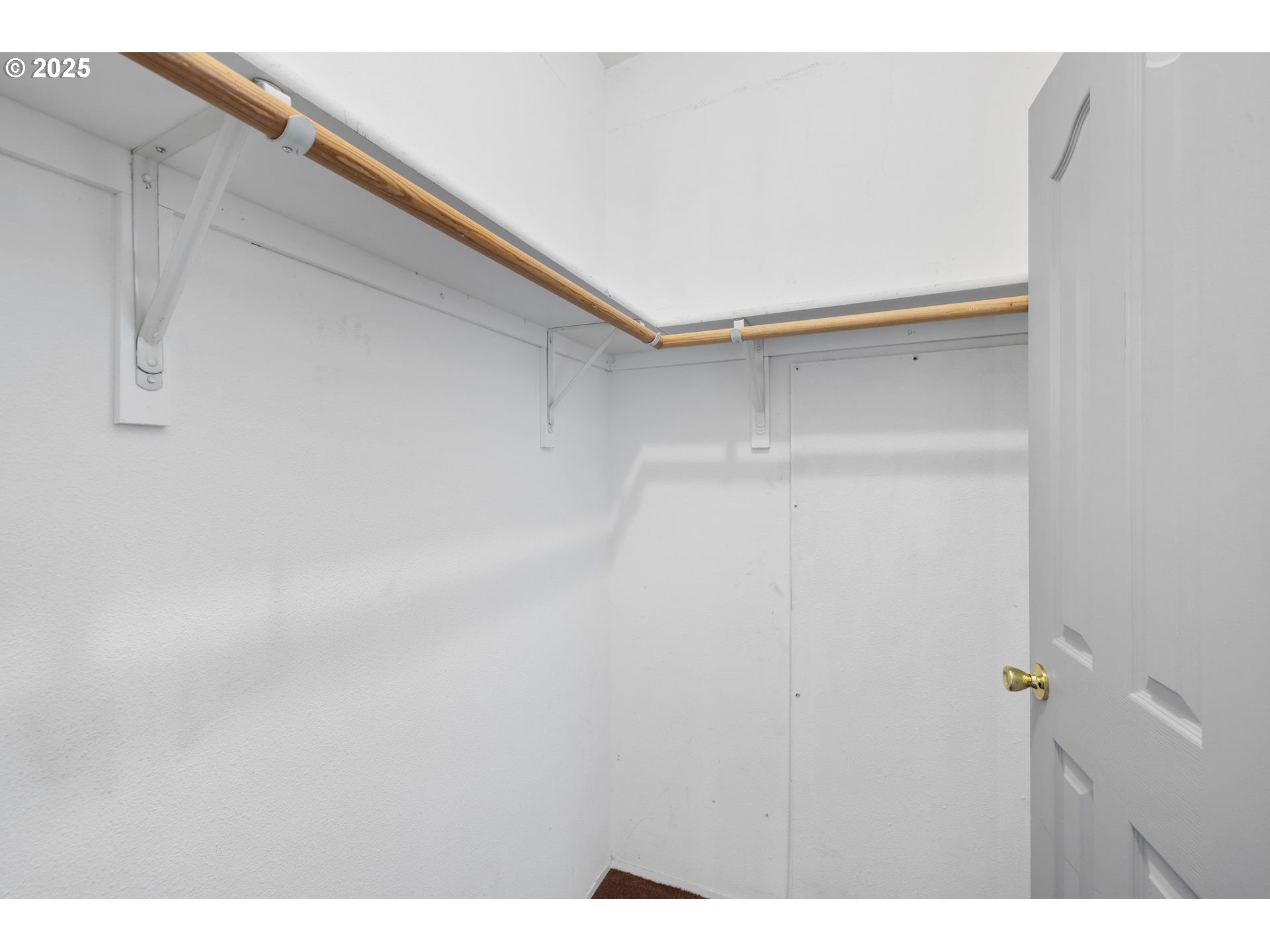 1949 Southeast Palmquist Road, Unit 121 Gresham, OR 97080 - Photo 31 of 37 a view of an empty walk in closet