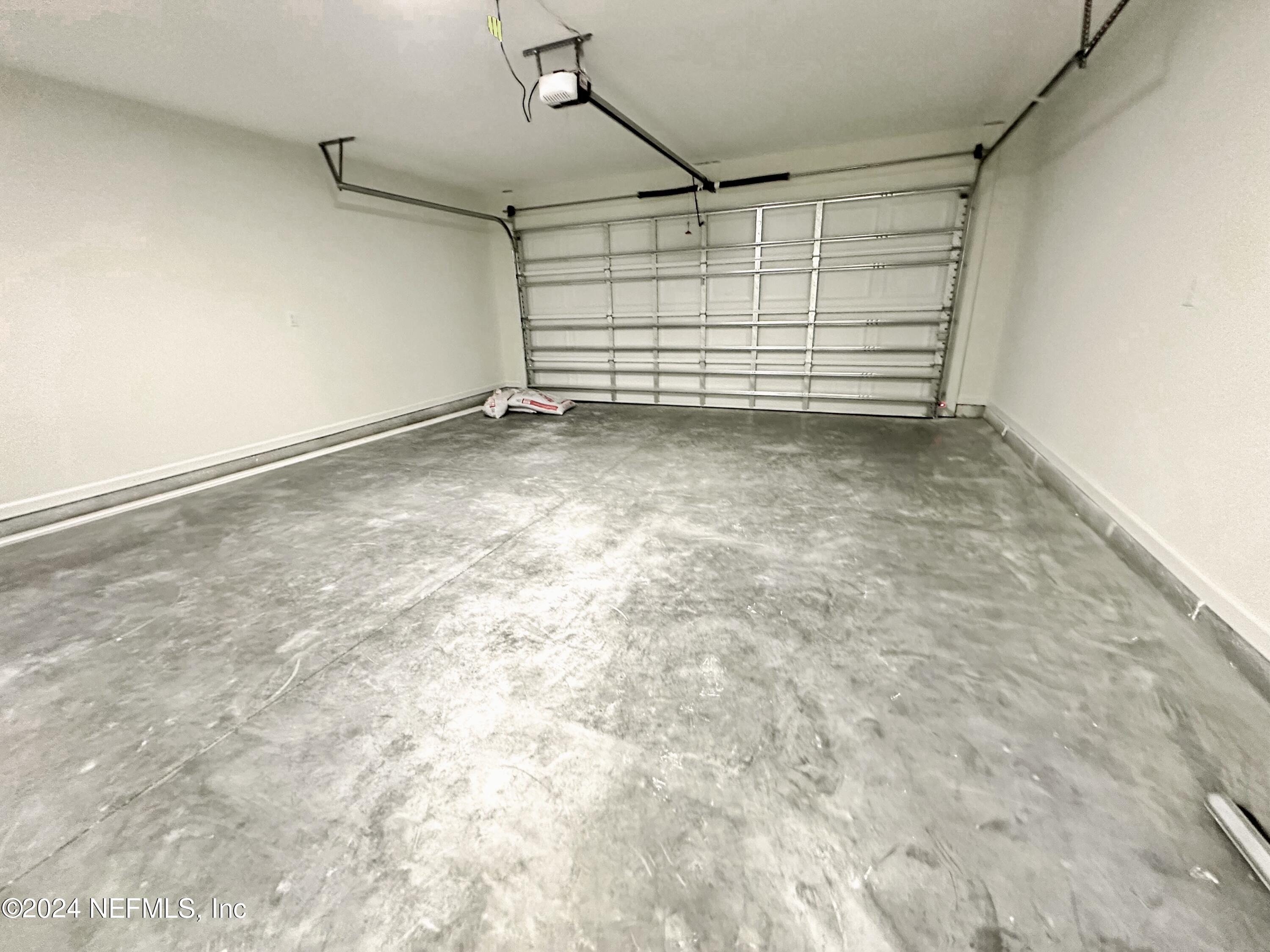 1047 Fleming Street Fleming Island, FL 32003 - Photo 13 of 15 a view of a garage