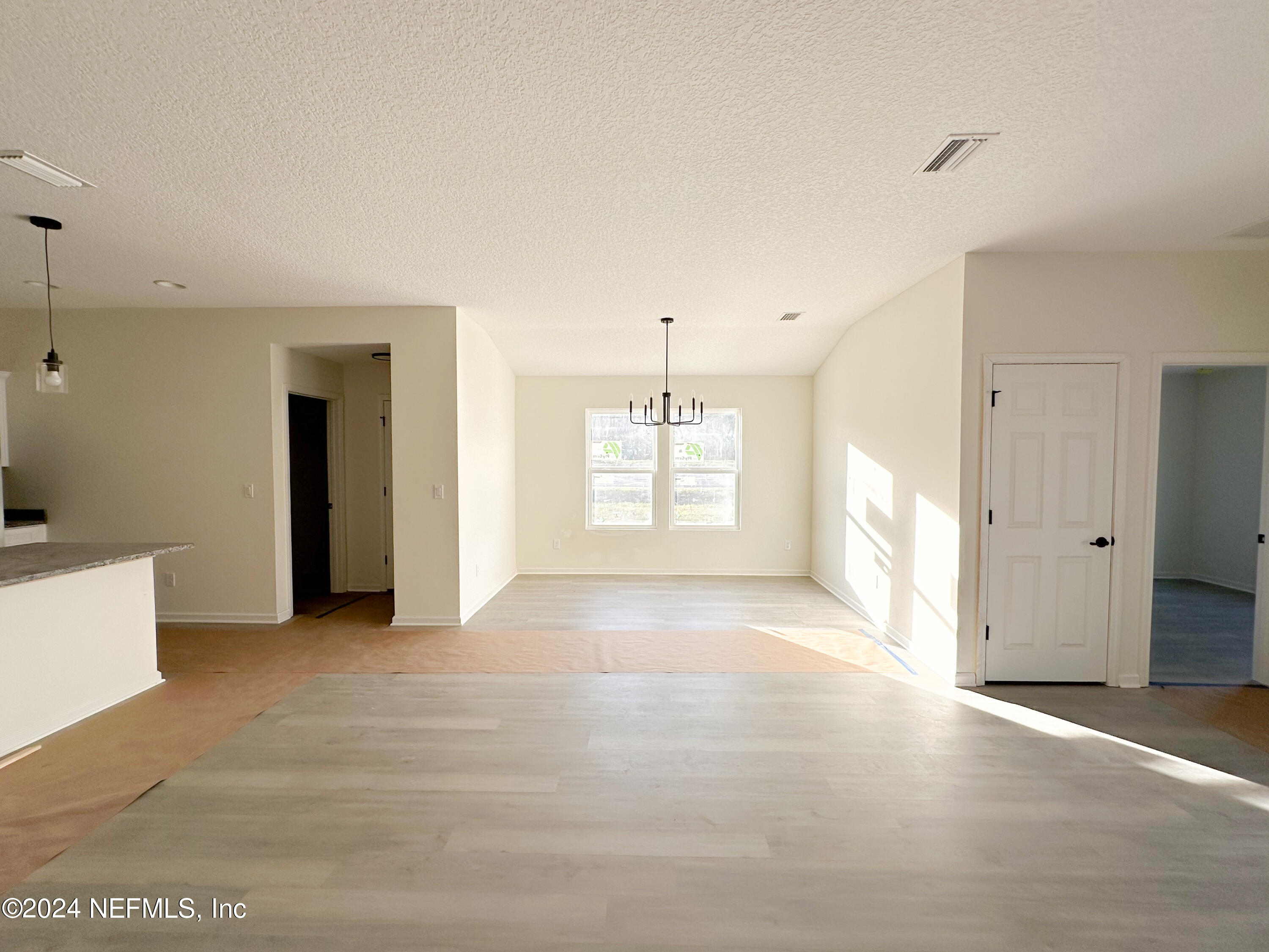 1047 Fleming Street Fleming Island, FL 32003 - Photo 5 of 15 a view of a livingroom with a fireplace