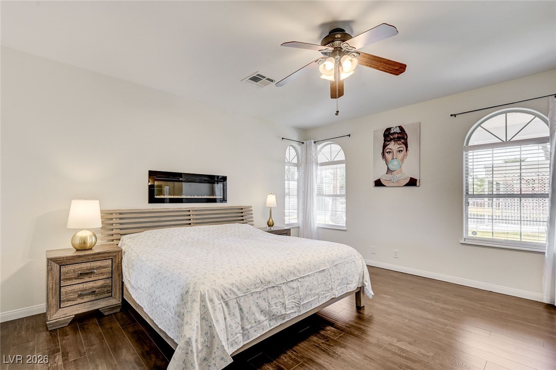 2955 El Camino Road Las Vegas, NV 89146 - Photo 51 of 99 Bedroom with a ceiling fan and hardwood / wood-style floors