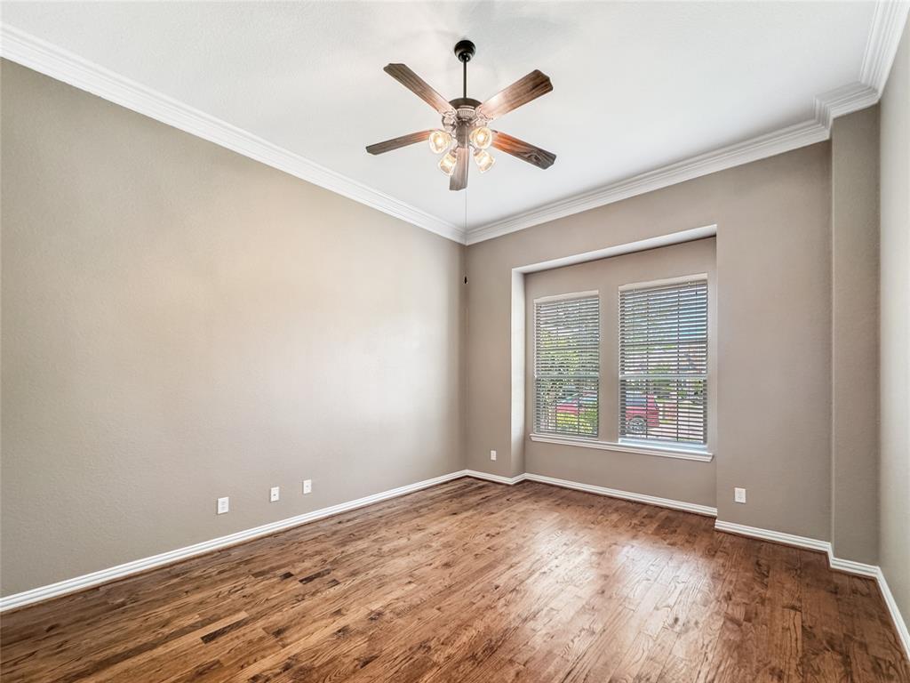 401 Varnum Way Fairview, TX 75069 - Photo 12 of 33 wooden floor in an empty room with a window