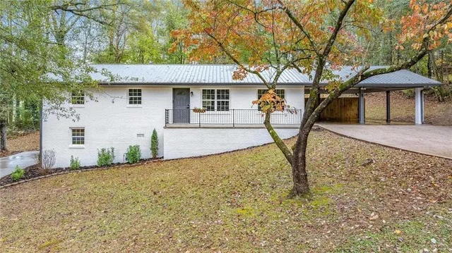 front view of a house with a yard