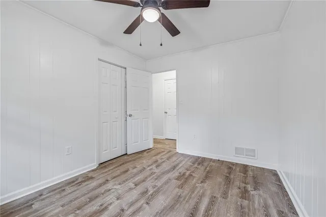 a view of a yard with a tree