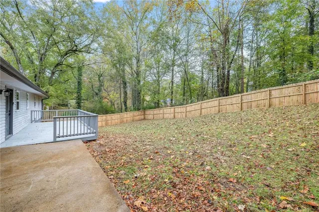 a view of residential house and tree