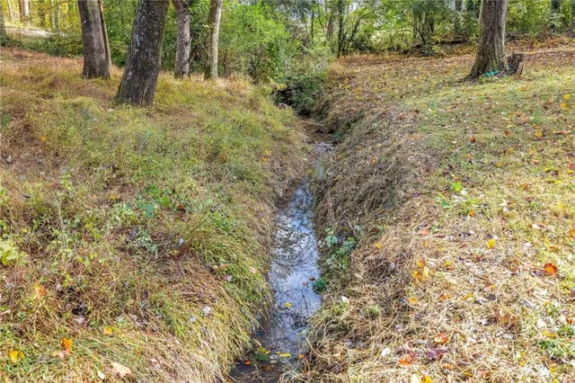 an aerial view of residential house with outdoor space