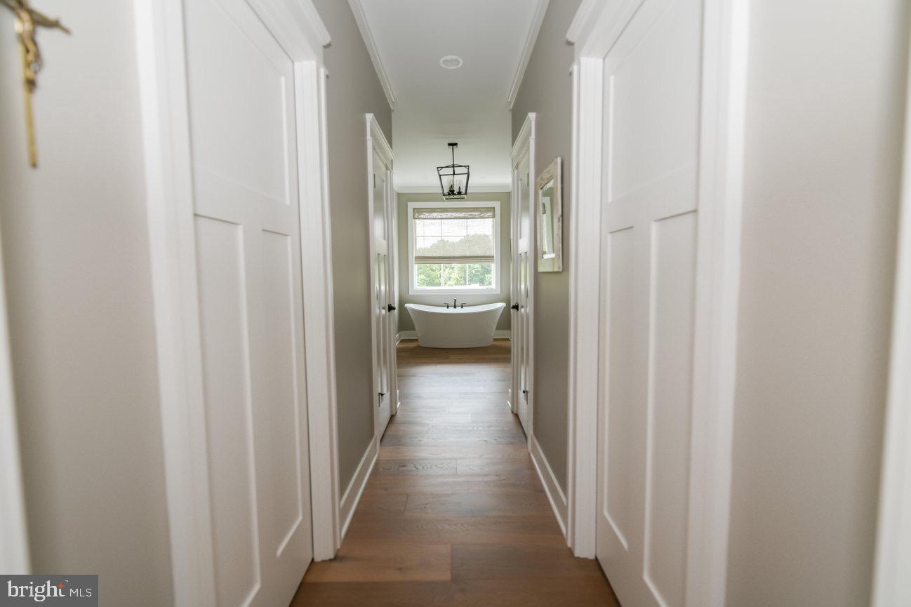 7091 Schoolhouse Road Hershey, PA 17033 - Photo 22 of 37 a view of a hallway with toilet and a closet