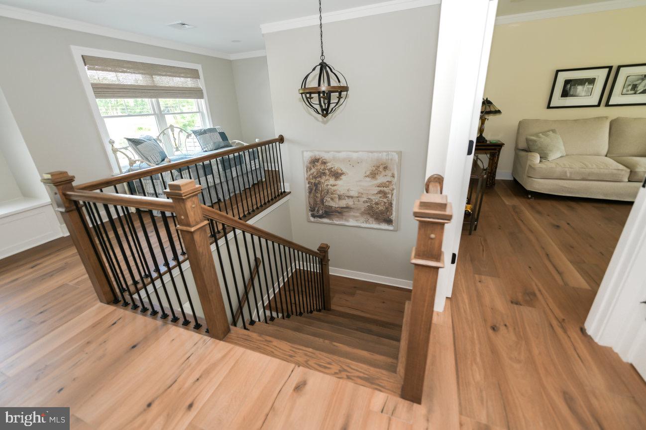 7091 Schoolhouse Road Hershey, PA 17033 - Photo 24 of 37 a view of entryway and hall with wooden floor