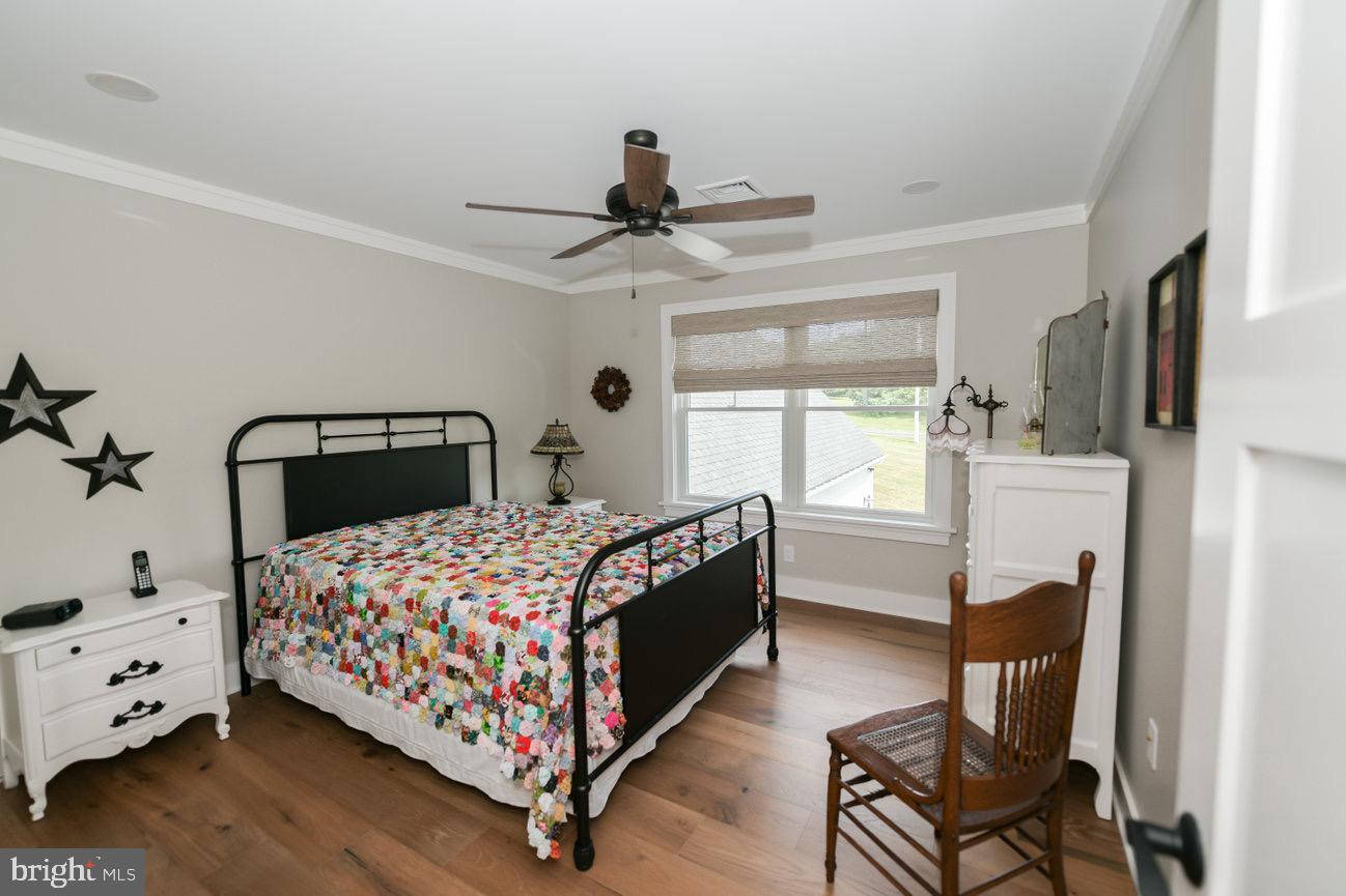 7091 Schoolhouse Road Hershey, PA 17033 - Photo 26 of 37 a bedroom with a bed chair and window