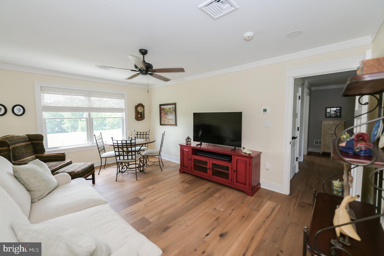 7091 Schoolhouse Road Hershey, PA 17033 - Photo 29 of 37 a living room with furniture and a flat screen tv