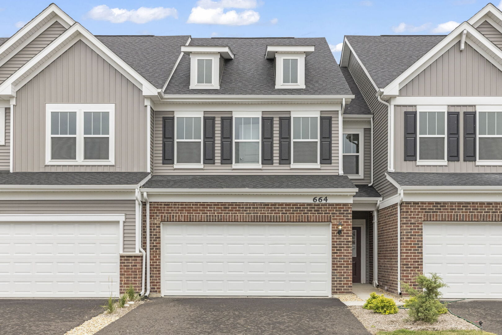 664 Switchgrass Way Bolingbrook, IL 60490 - Photo 1 of 35 a front view of a house