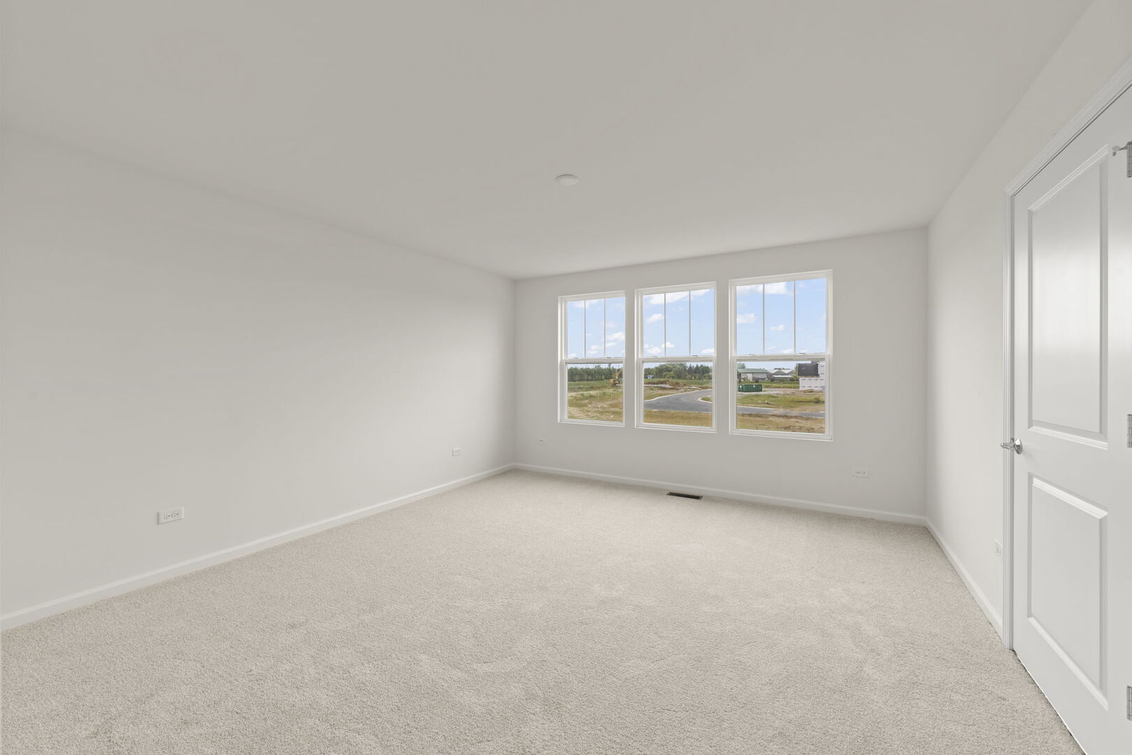 664 Switchgrass Way Bolingbrook, IL 60490 - Photo 14 of 35 a view of an empty room with a window