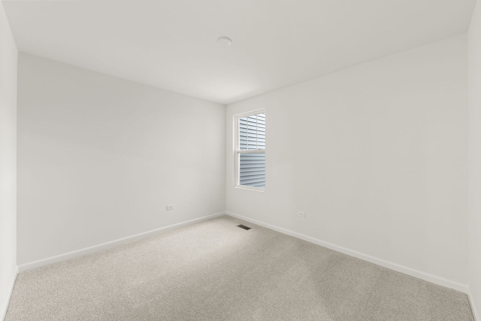 664 Switchgrass Way Bolingbrook, IL 60490 - Photo 22 of 35 a view of an empty room with a window