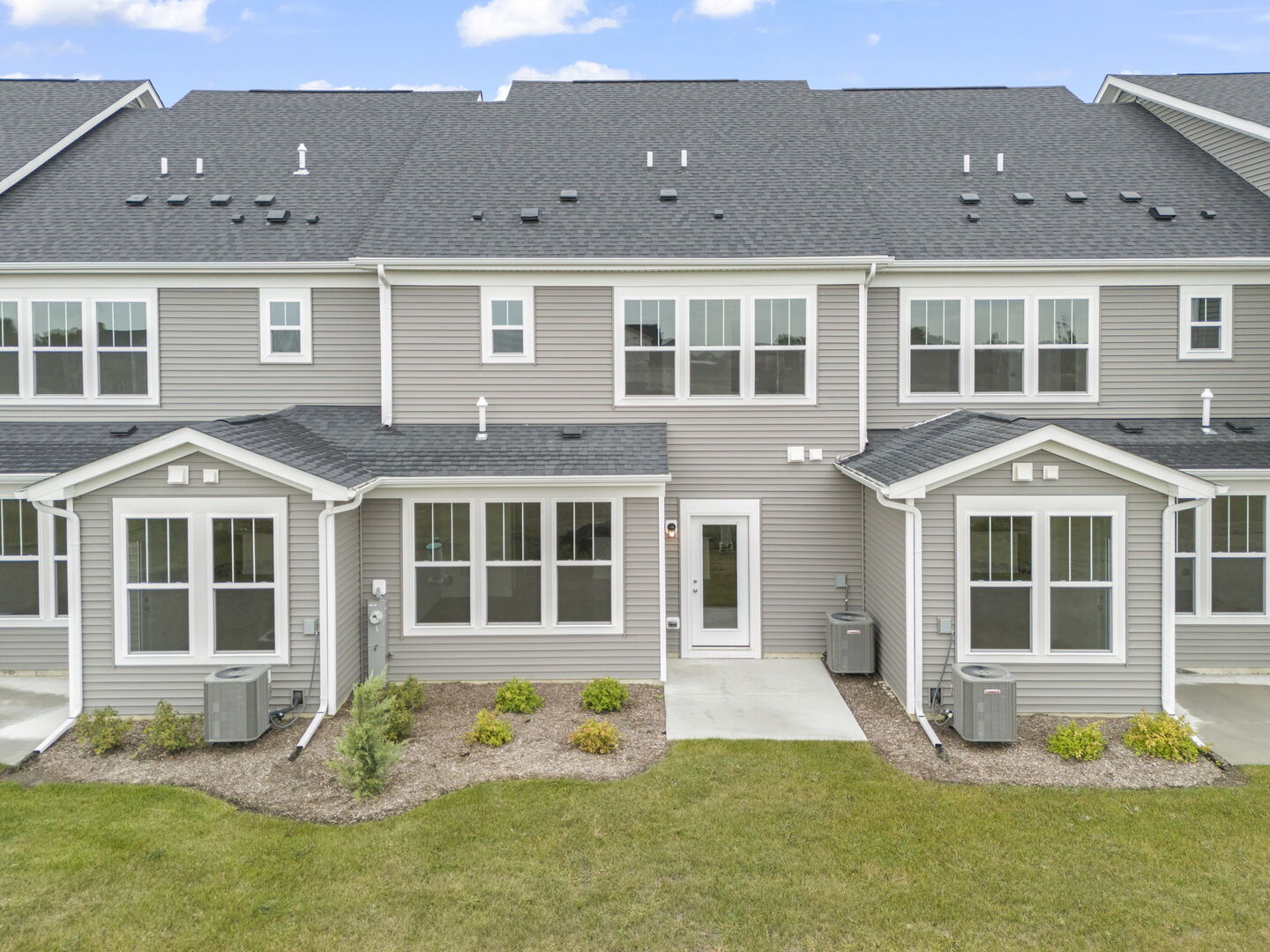 664 Switchgrass Way Bolingbrook, IL 60490 - Photo 25 of 35 a front view of a house with a yard