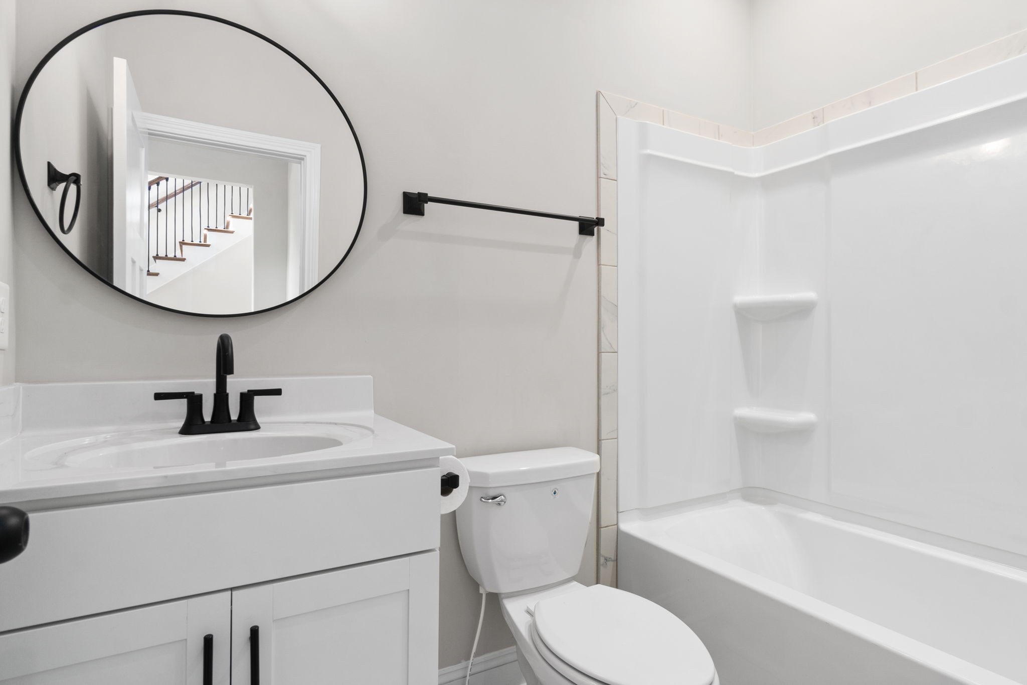 2964 Kirkwood Road Clarksville, TN 37043 - Photo 24 of 35 a bathroom with a sink a toilet and a mirror