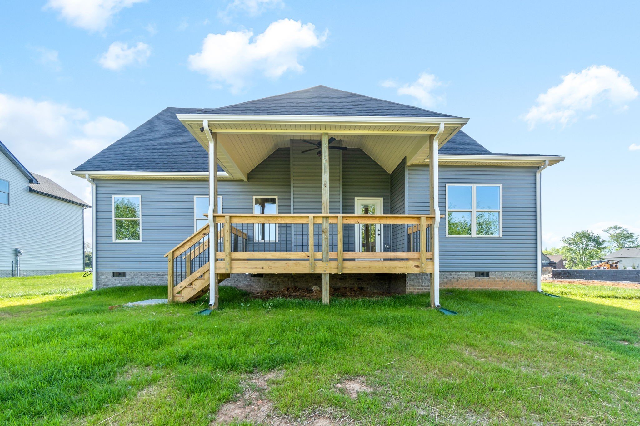 2964 Kirkwood Road Clarksville, TN 37043 - Photo 33 of 35 a front view of a house with a yard table and chairs