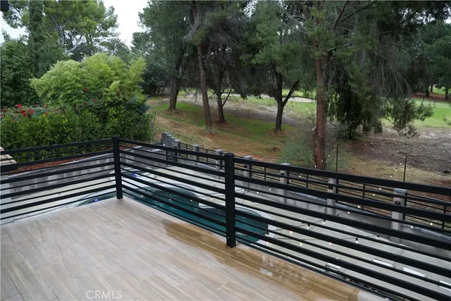 a kitchen with a sink and a large window