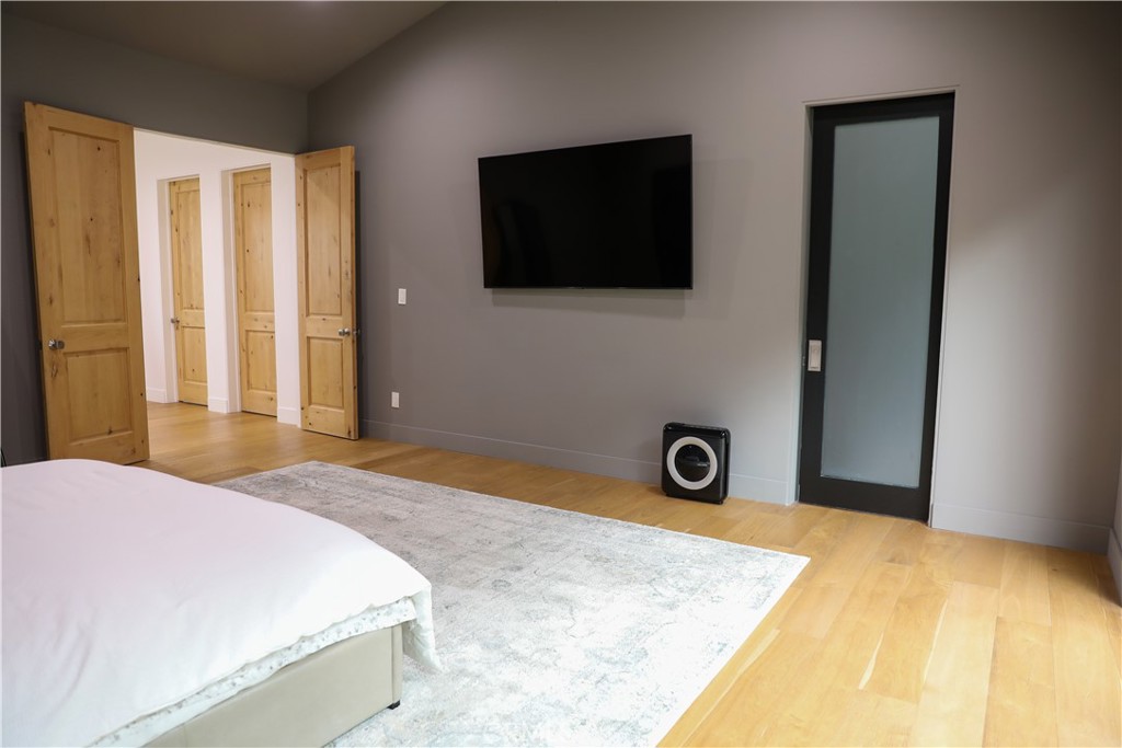 12664 McLennan Avenue Granada Hills, CA 91344 - Photo 29 of 61 a bedroom with a bed and a flat screen tv