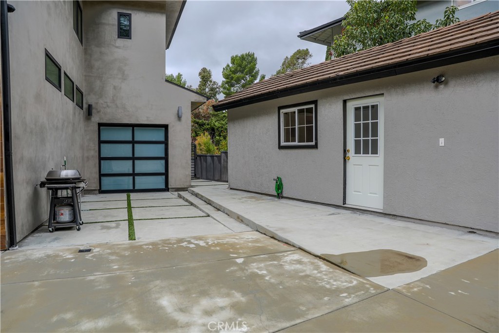 12664 McLennan Avenue Granada Hills, CA 91344 - Photo 53 of 61 a house view with a backyard space