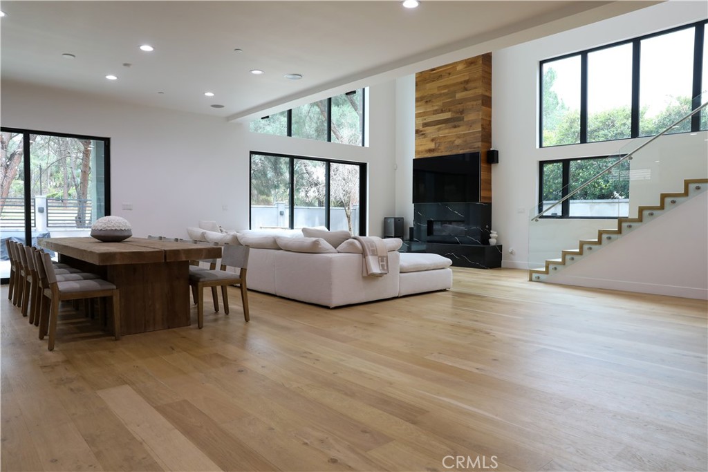 12664 McLennan Avenue Granada Hills, CA 91344 - Photo 54 of 61 a living room with furniture and a flat screen tv