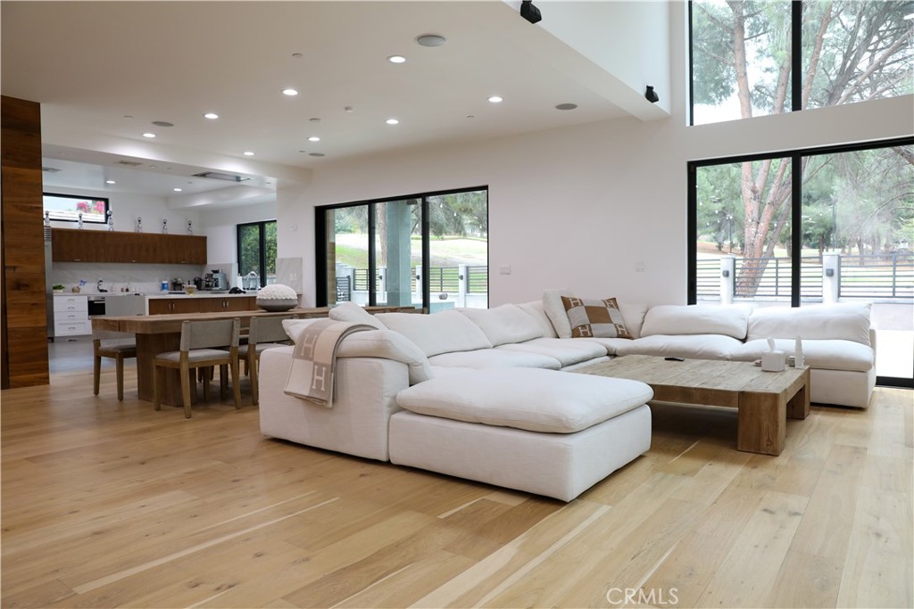 12664 McLennan Avenue Granada Hills, CA 91344 - Photo 56 of 61 a living room with furniture and a large window