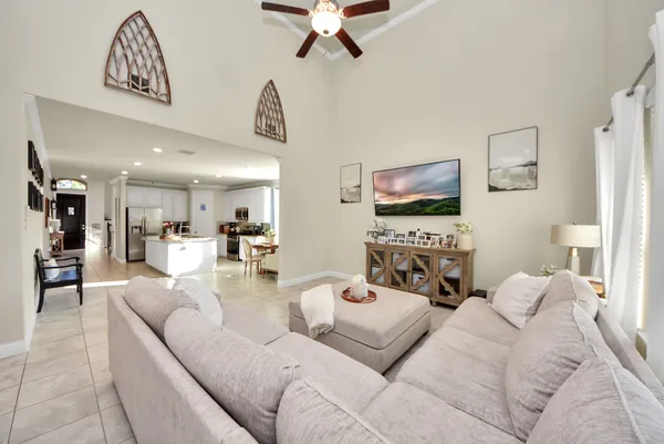 a living room with furniture and a window