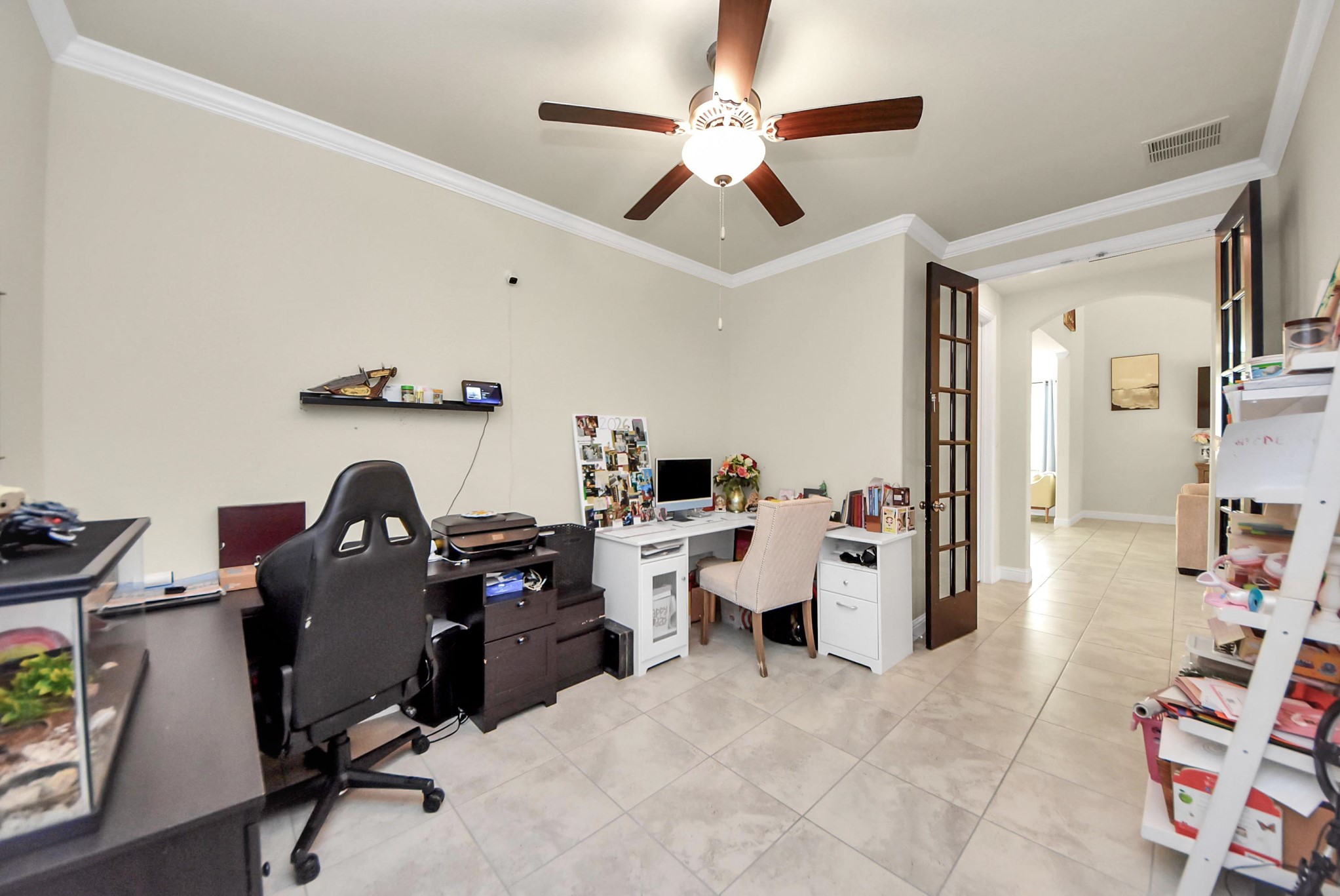 6703 Sandia Crest Street Spring, TX 77379 - Photo 20 of 45 a work room with furniture and wooden floor