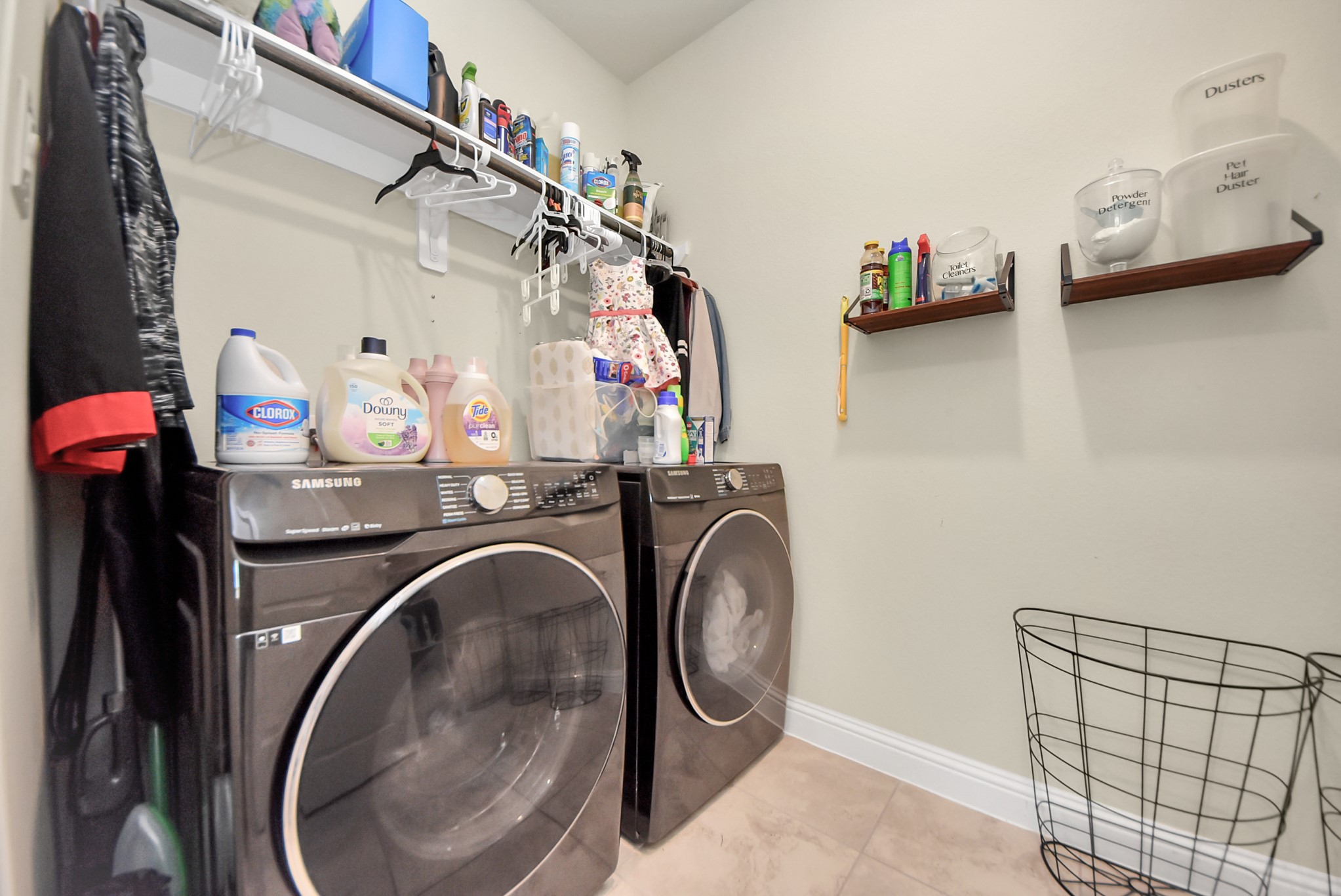 6703 Sandia Crest Street Spring, TX 77379 - Photo 21 of 45 a utility room with dryer and washer