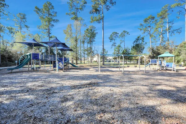 a view of a park with a slide