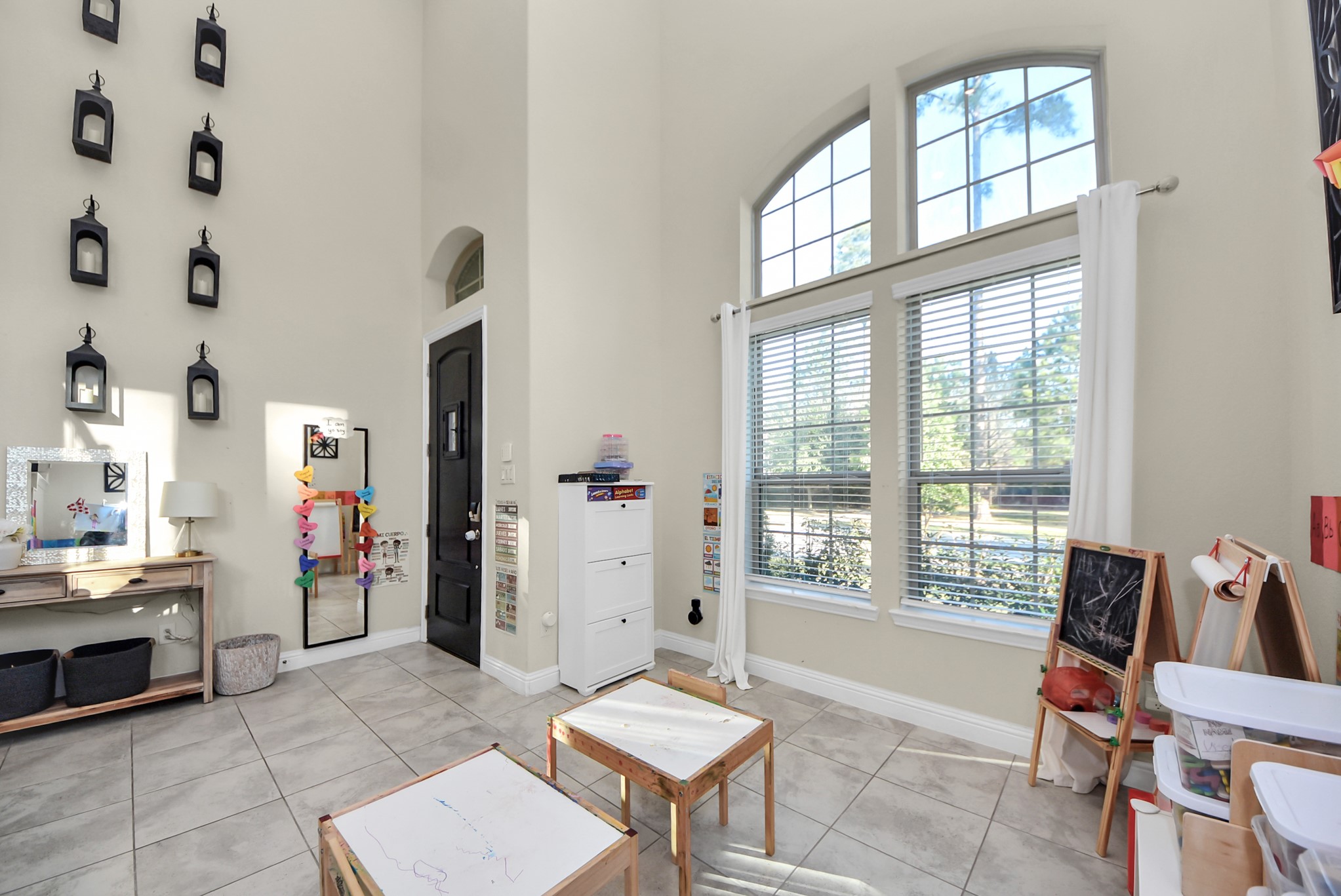 6703 Sandia Crest Street Spring, TX 77379 - Photo 6 of 45 a living room with furniture and a window