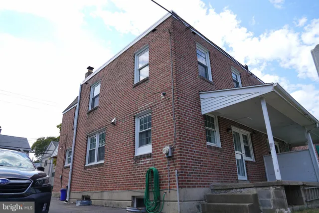 a house that has a window in front of it