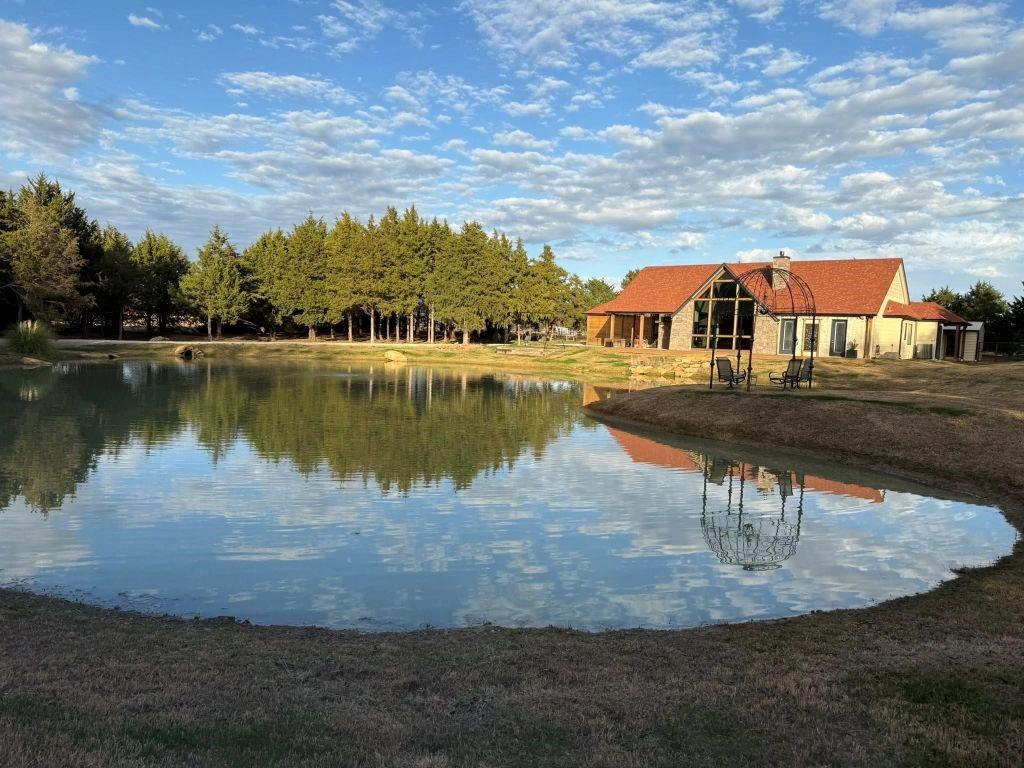 180 East Greer Road Sadler, TX 76264 - Photo 2 of 40 a view of a lake with a yard