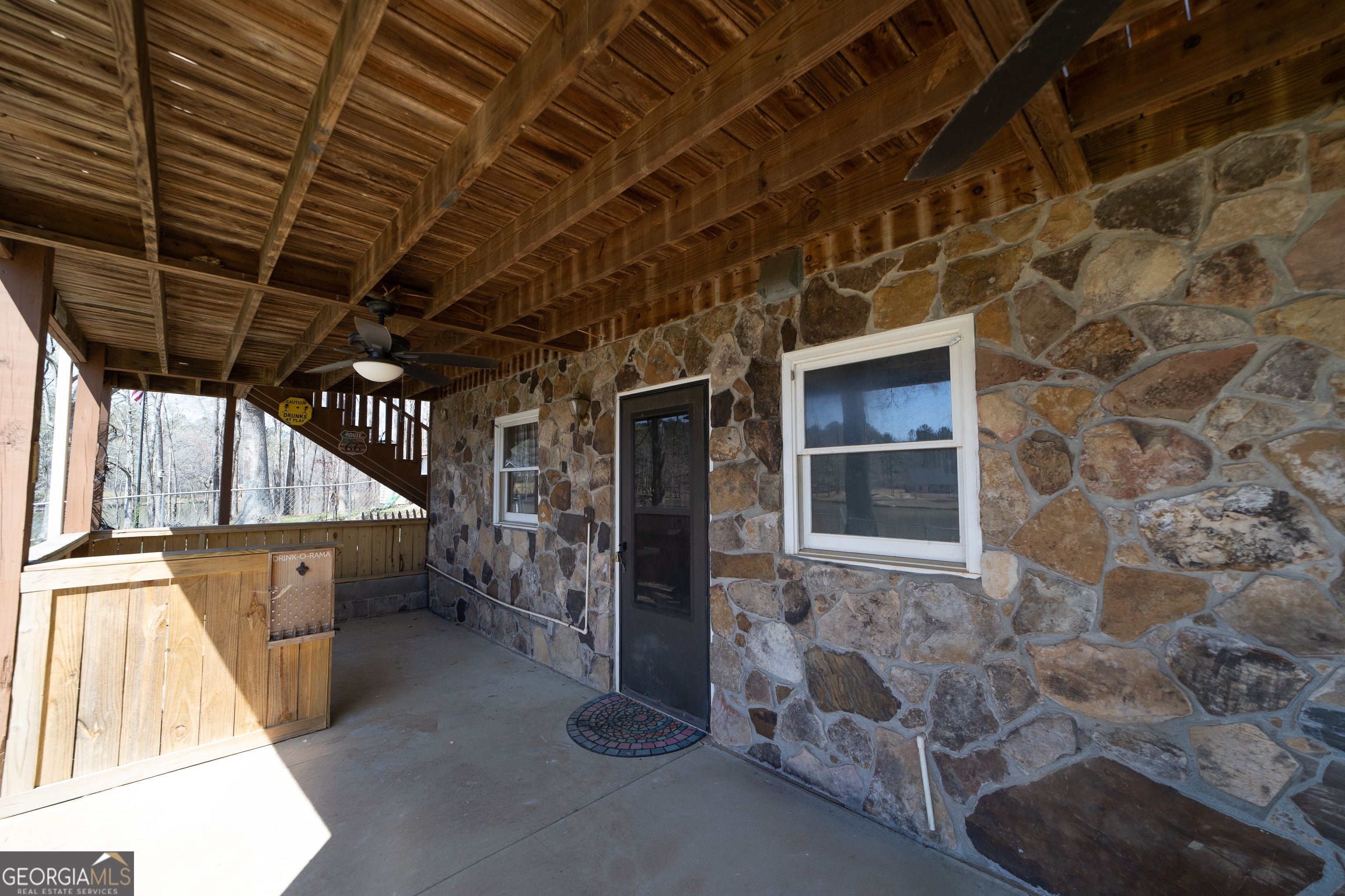 1448 Bohannon Road Grantville, GA 30220 - Photo 46 of 61 Patio and exterior entrance to downstairs