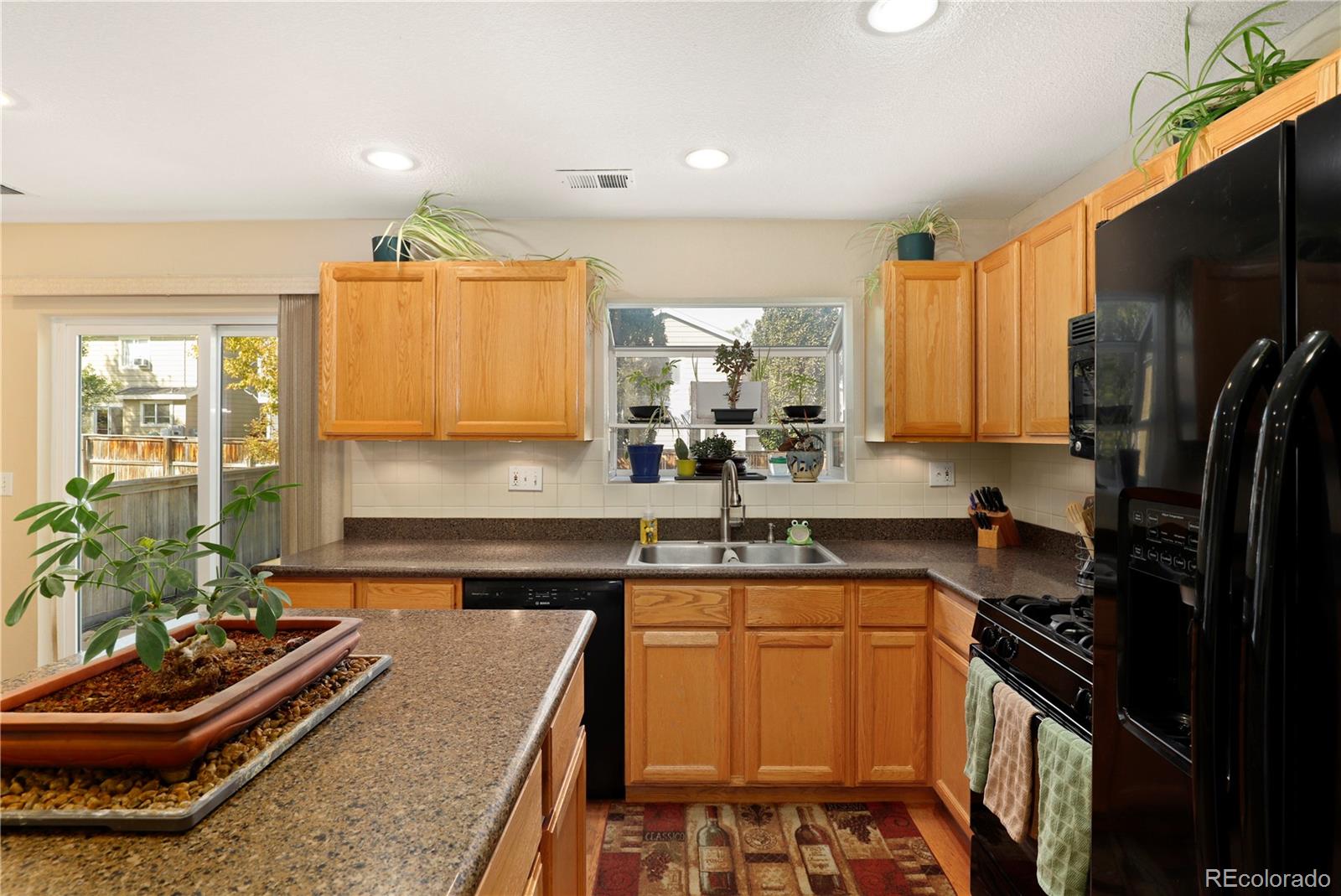 9851 Saybrook Street Highlands Ranch, CO 80126 - Photo 8 of 24 Gallery Image 8