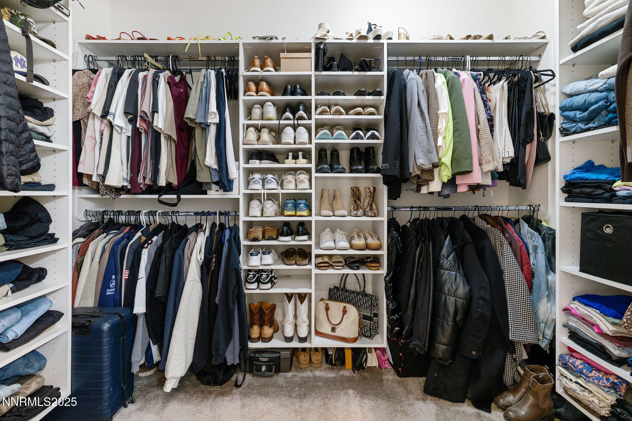 3011 Silverberry Lane Reno, NV 89521 - Photo 12 of 25 a view of walk in closet with clothes and shoes