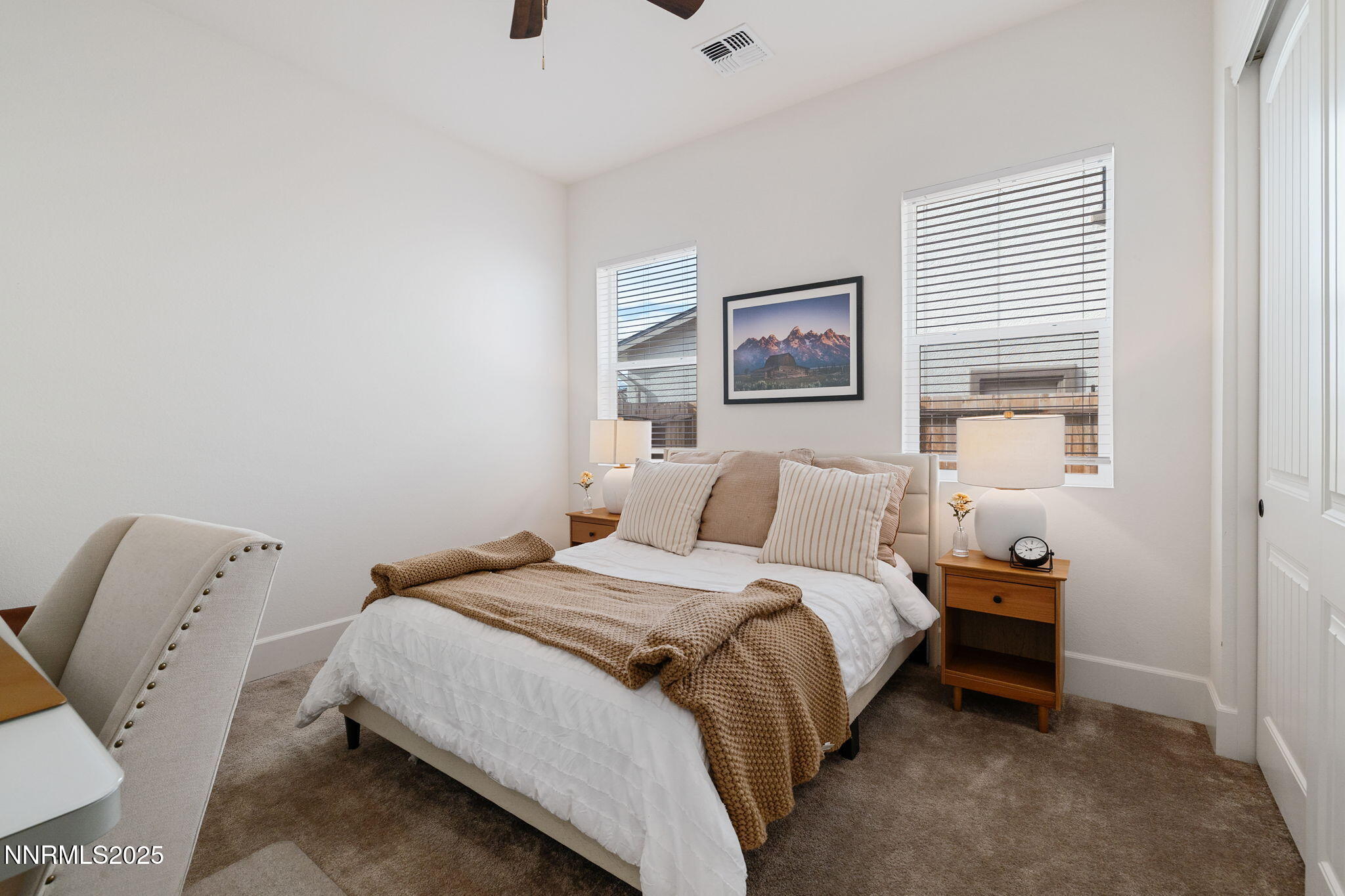 3011 Silverberry Lane Reno, NV 89521 - Photo 13 of 25 a bedroom with a bed and a painting on the wall